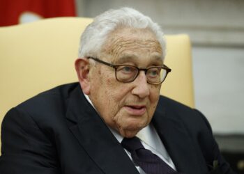 FILE - Former Secretary of State Henry Kissinger speaks during a meeting with President Donald Trump in the Oval Office of the White House, Tuesday, Oct. 10, 2017, in Washington. Kissinger marks his 100th birthday on Saturday, May 27, 2023, outlasting many of his political contemporaries who guided the United States through one of its most tumultuous periods including the presidency of Richard Nixon and the Vietnam War. (AP Photo/Evan Vucci, File)