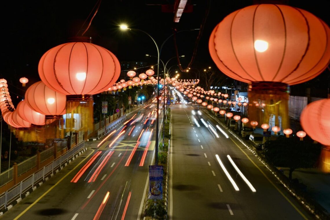 Thousands of redsilk lanterns light up the street at Jalan Raja Uda