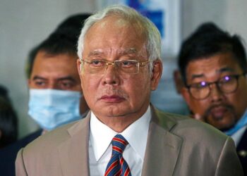 Former Prime Minister Datuk Seri Najib Razak reacts during the press at the Kuala Lumpur High Court on Tuesday night. IZZRAFIQ ALIAS / The Star. July 28, 2020.