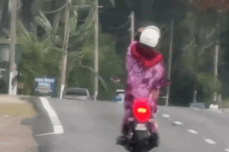 Age is just a number: Mat Rempit auntie grabs attention and danger with stunts