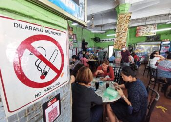 No smoking signage put up in a coffee shop in George Town, Penang. Malaysia enforced a no-smoking rulling at all eateries and restaurants nationwide on Jan 1,2019. ( FEB 08,2023 ) — K.T.GOH/The Star