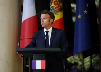 FILE PHOTO: French President Emmanuel Macron gives a statement following a meeting with Moldovan President Maia Sandu (not pictured) in Chisinau, Moldova, June 15, 2022. Yoan Valat/Pool via REUTERS