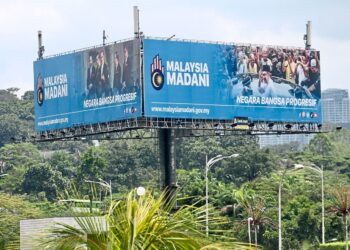 Anwar face display at  MADANI bill bord. —LOW LAY PHON/The Star