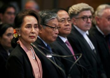 FILE PHOTO: Myanmar's leader Aung San Suu Kyi attends a hearing in a case filed by Gambia against Myanmar alleging genocide against the minority Muslim Rohingya population, at the International Court of Justice (ICJ) in The Hague, Netherlands December 10, 2019.  REUTERS/Yves Herman/File Photo