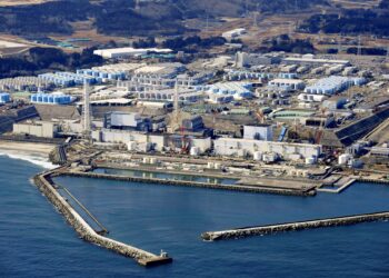 FILE PHOTO: An aerial view shows the storage tanks for treated water at the tsunami-crippled Fukushima Daiichi nuclear power plant in Okuma town, Fukushima prefecture, Japan February 13, 2021, in this photo taken by Kyodo. Kyodo/via REUTERS