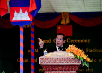 FILE PHOTO: Cambodian Prime Minister Hun Sen speaks during a ceremony at the Morodok Techo National Stadium in Phnom Penh, Cambodia, September 12, 2021. Tang Chhin Sothy/Pool via REUTERS/File Photo