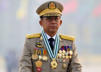 FILE PHOTO: Myanmar's junta chief Senior General Min Aung Hlaing, who ousted the elected government in a coup, presides at an army parade on Armed Forces Day in Naypyitaw, Myanmar, March 27, 2021. REUTERS/Stringer To match Special Report MYANMAR-POLITICS/YOUTH-RESISTANCE