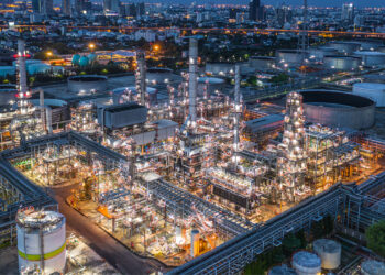 Aerial view oil refinery, refinery plant, refinery factory at night.