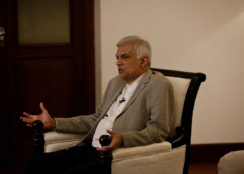 FILE PHOTO: Sri Lanka's Prime Minister Ranil Wickremesinghe gestures as he speaks during an interview with Reuters at his office in Colombo, Sri Lanka, May 24, 2022. REUTERS/Adnan Abidi