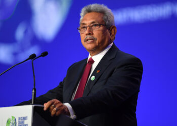 Sri Lanka's President Gotabaya Rajapaksa presents his national statement as a part of the World Leaders' Summit at the UN Climate Change Conference (COP26) in Glasgow, Scotland, Britain November 1, 2021. Andy Buchanan/Pool via REUTERS/Files